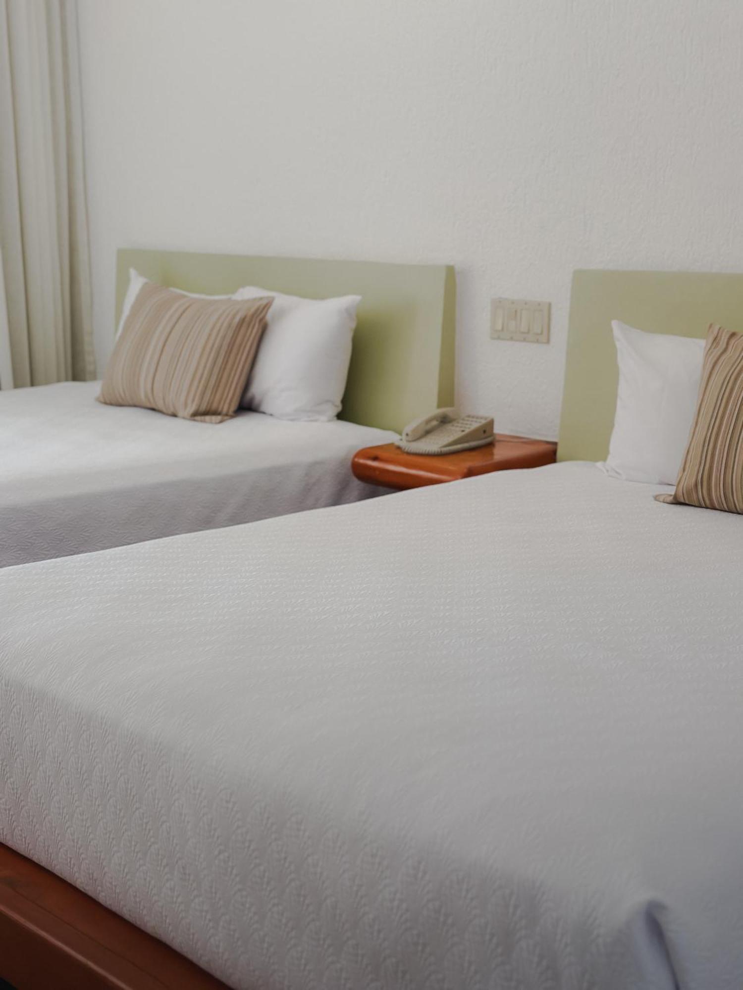 Standard Room 2 queen size beds balcony