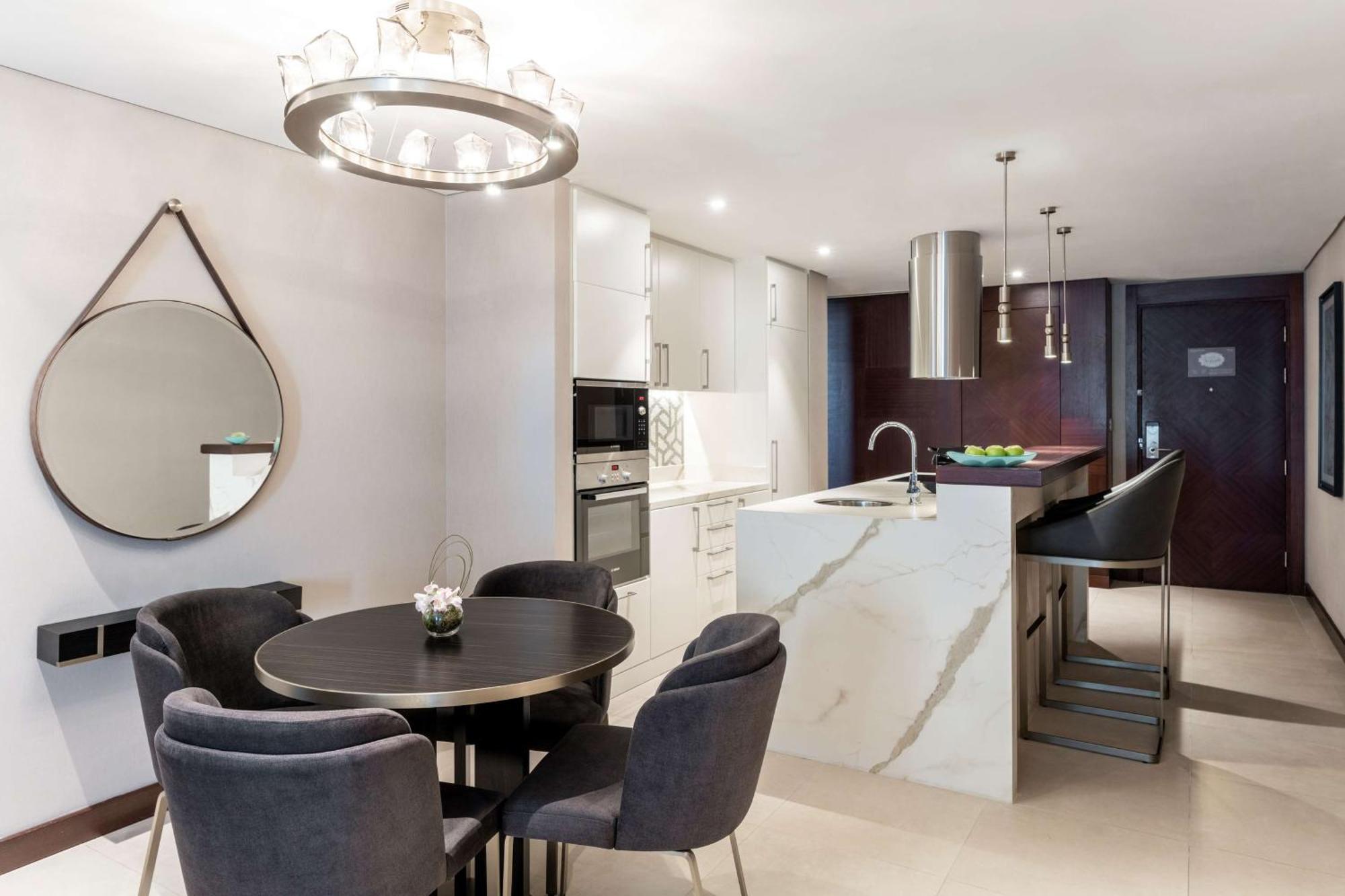 Superior One-Bedroom Suite with Partial Sea View