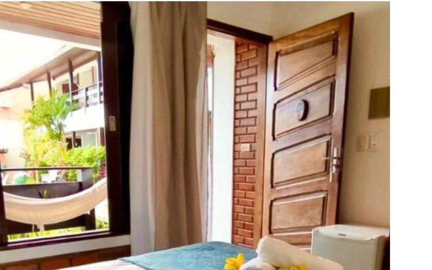 Quarto Duplo com Varanda e Cama Extra