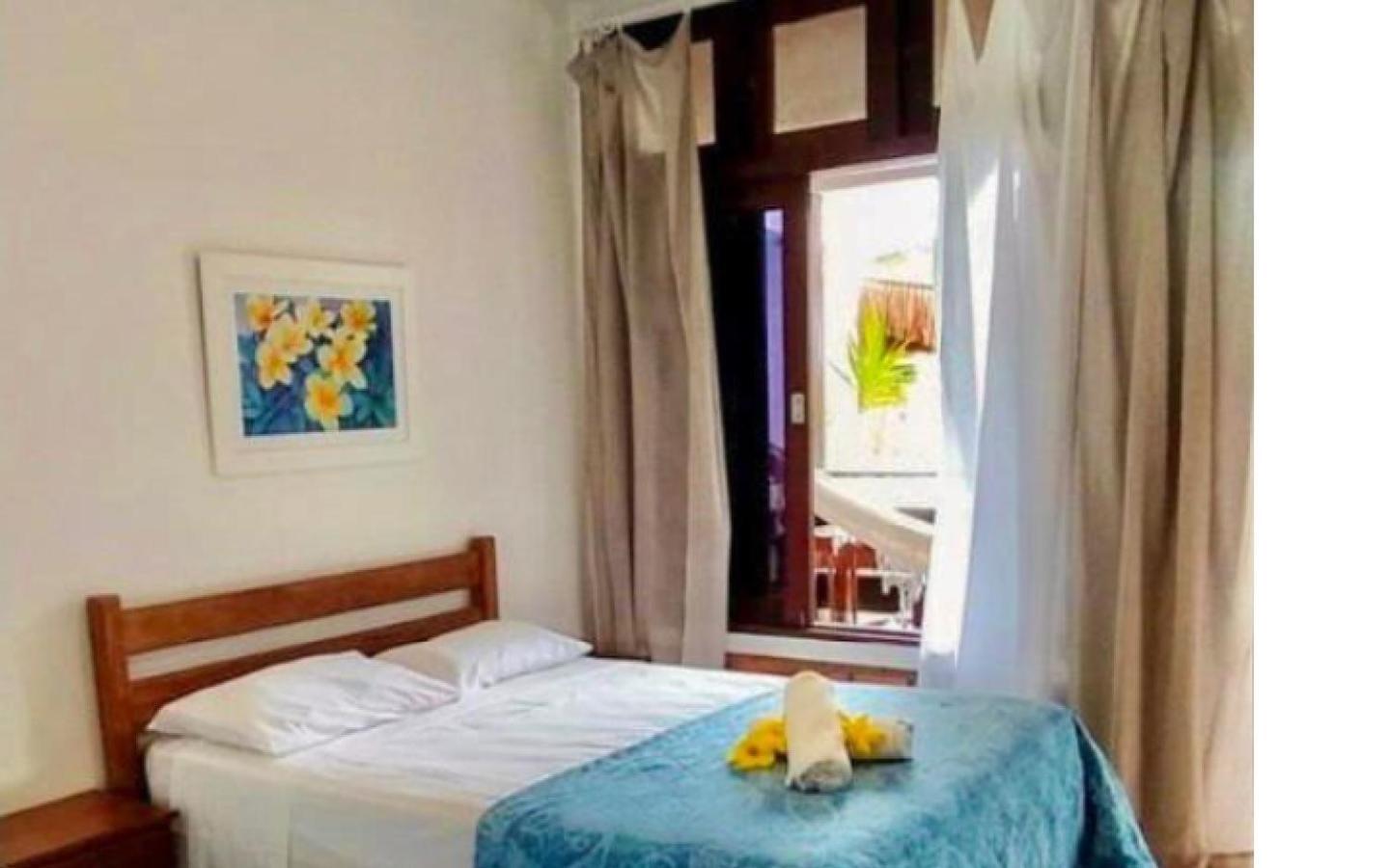Quarto Duplo com Varanda e Cama Extra