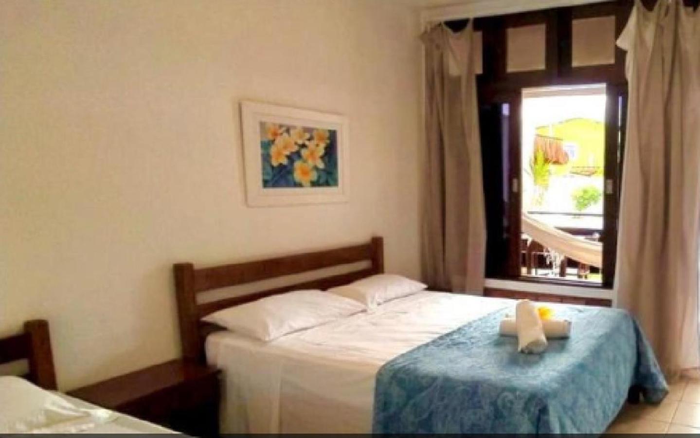 Quarto Duplo com Varanda e Cama Extra