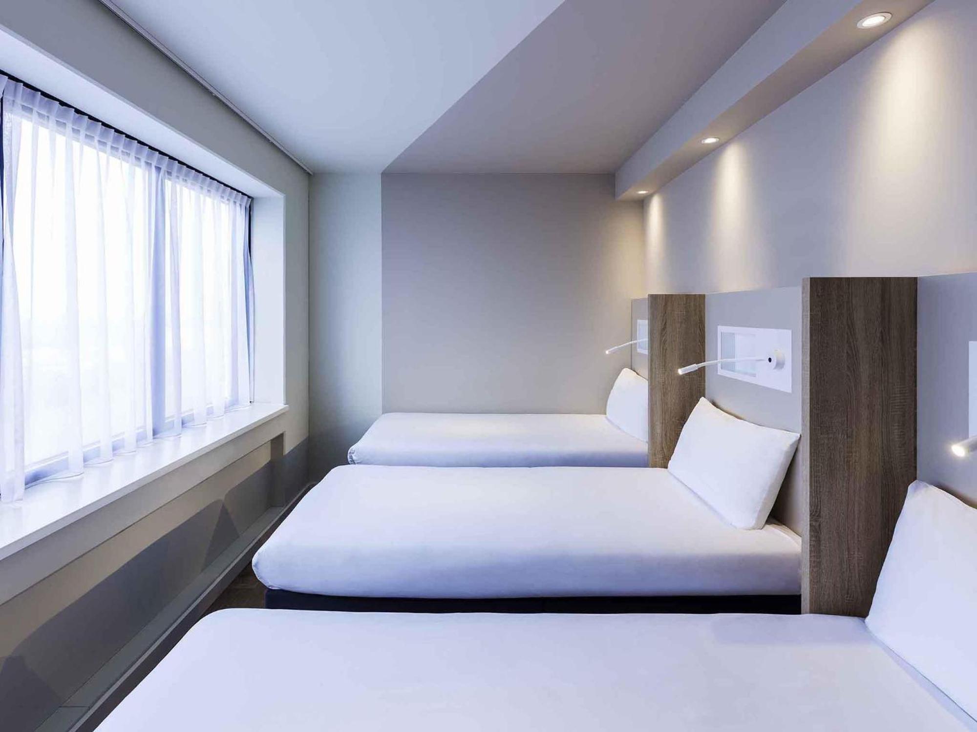 Room Three Single Beds
