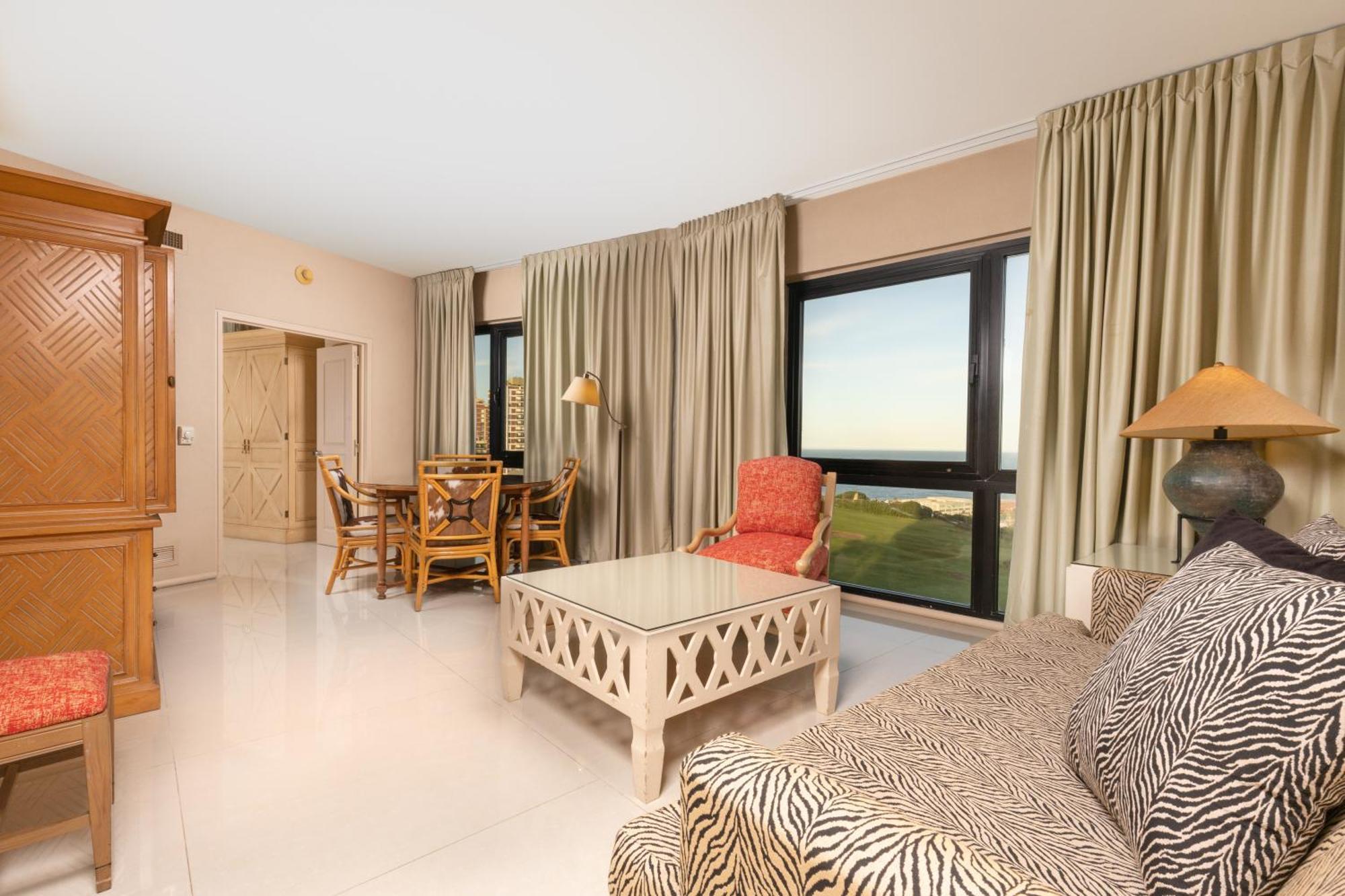 1 Bedroom Executive Suite Bedroom 1 1 King Bedroom 2 Sea View