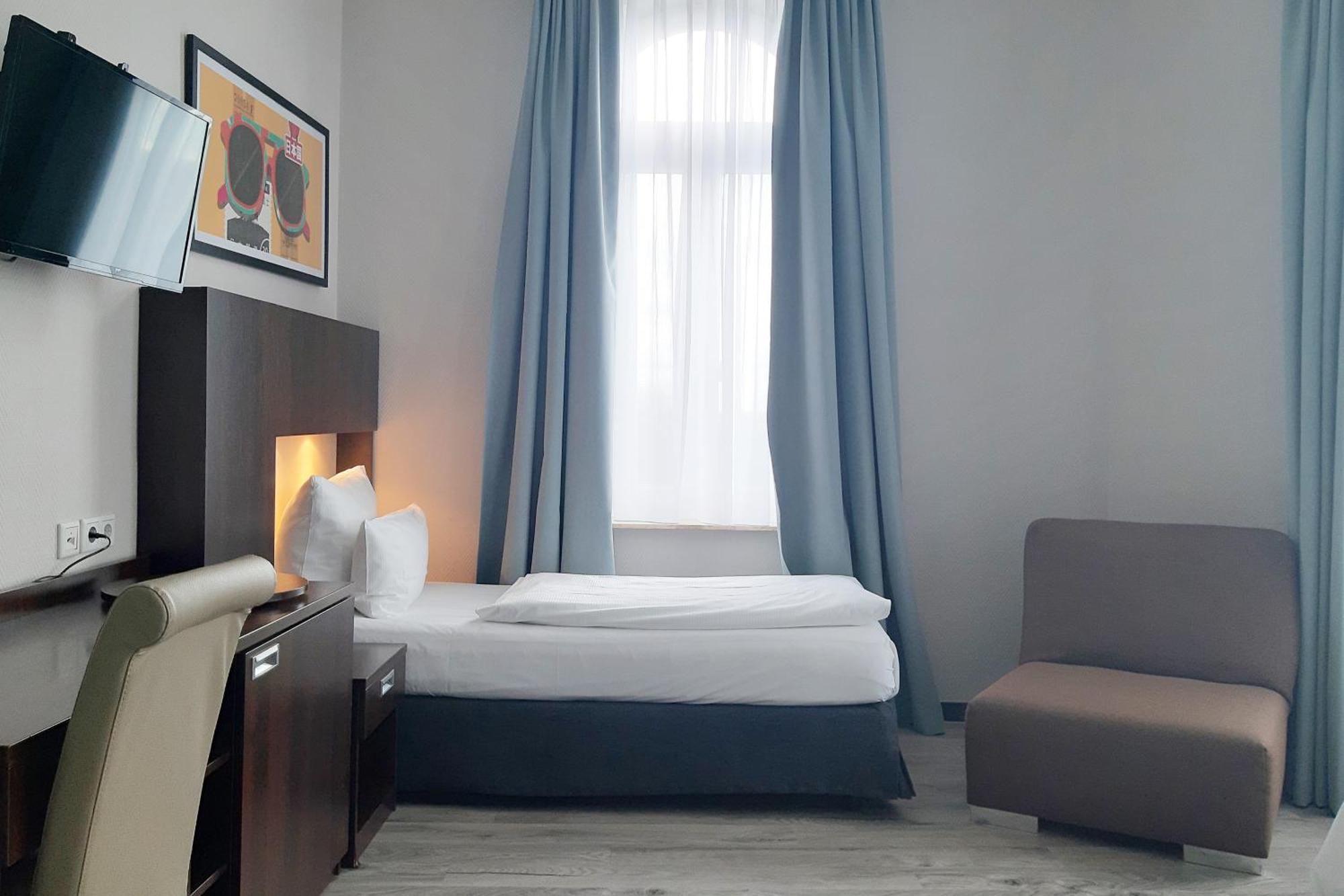 Premium King Room One Single Sofa Bed