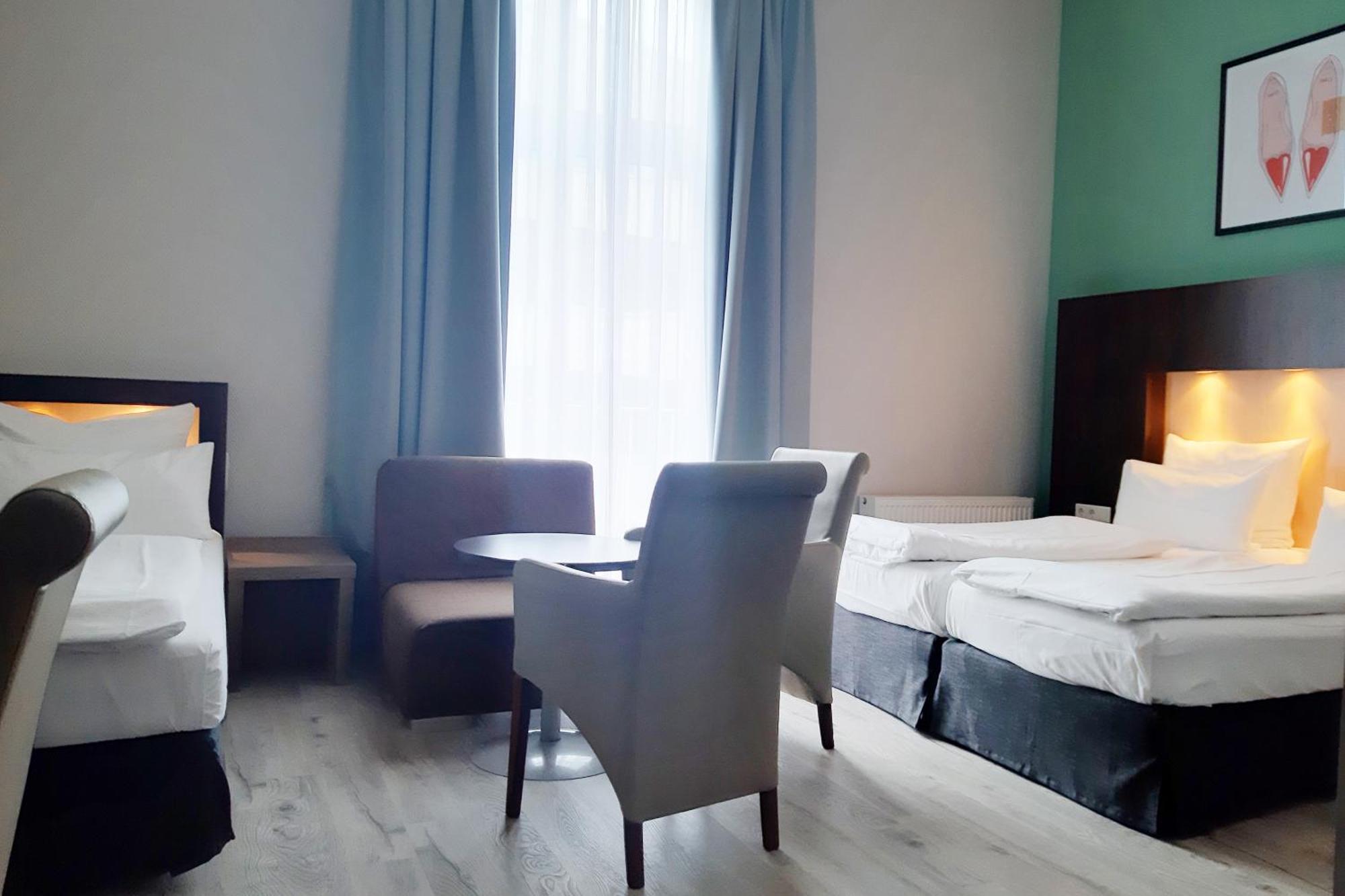 Premium King Room One Single Sofa Bed