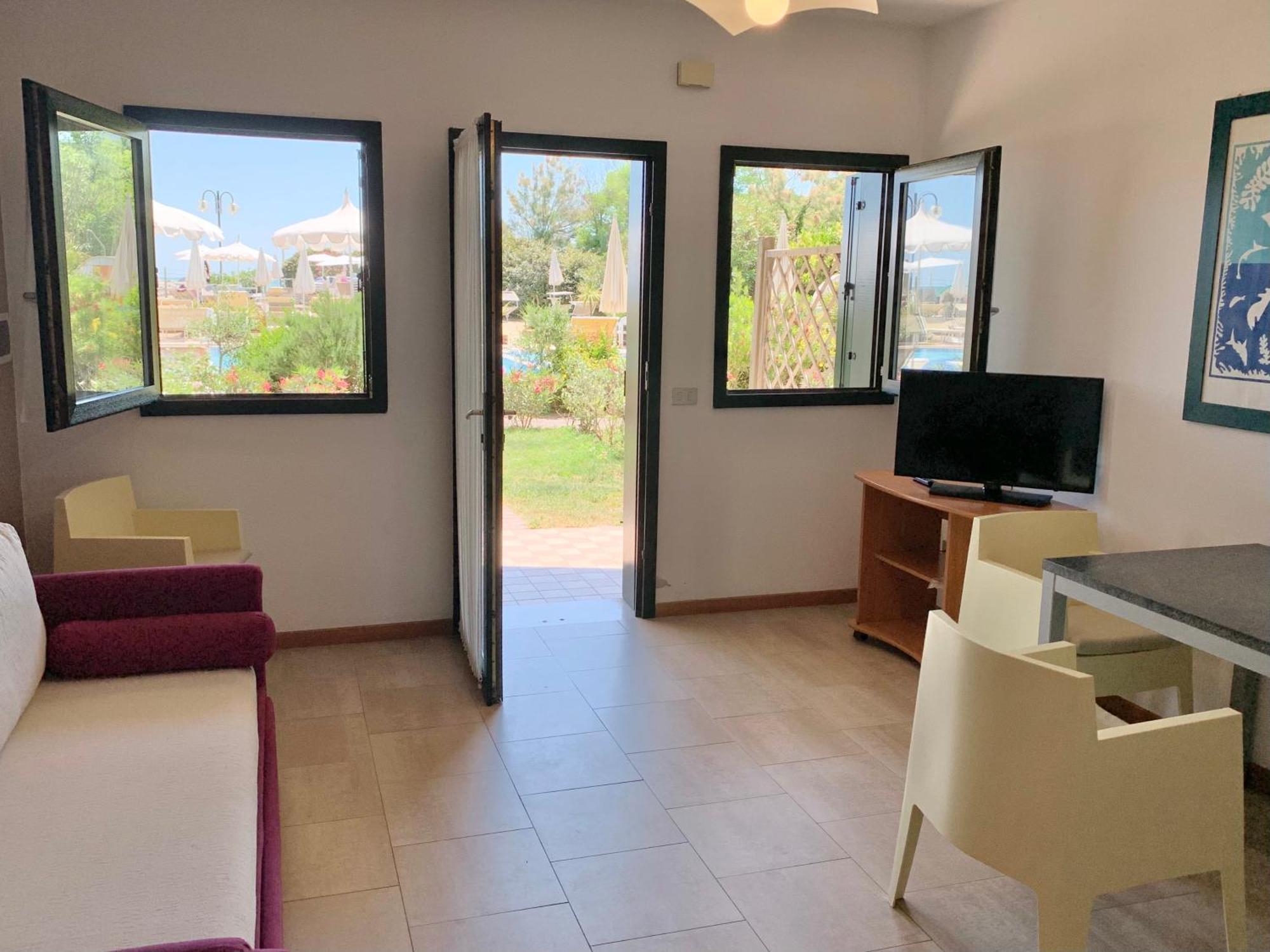 Two-Room Family Apartment Private Garden facing the Pool – Ground Floor
