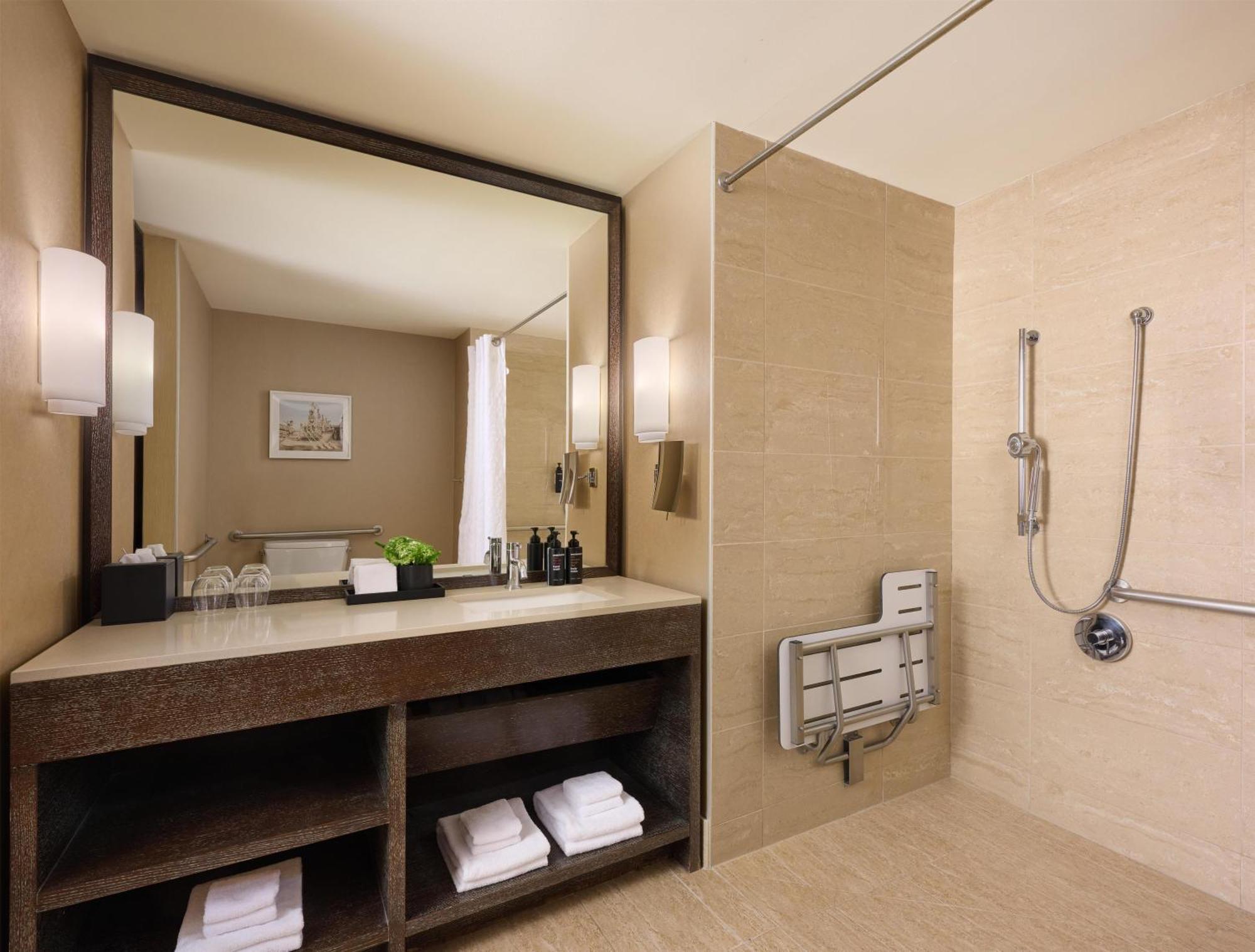 Deluxe Two Double Beds Roll Shower Mobility or Hearing Accessible