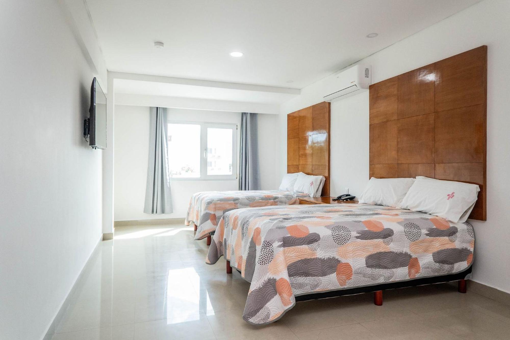 Quarto Duplo Superior com 2 Camas de Casal