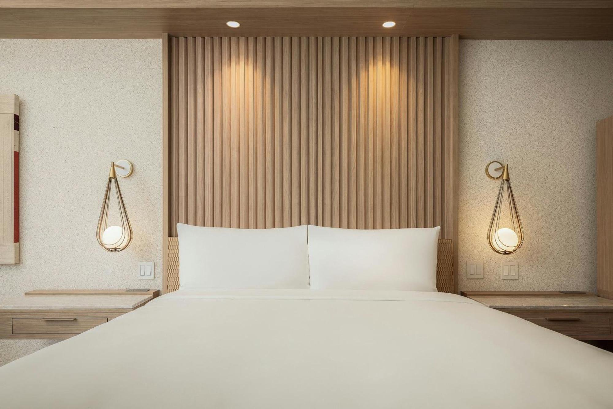 King Guest Room Balcony Partial Ocean View