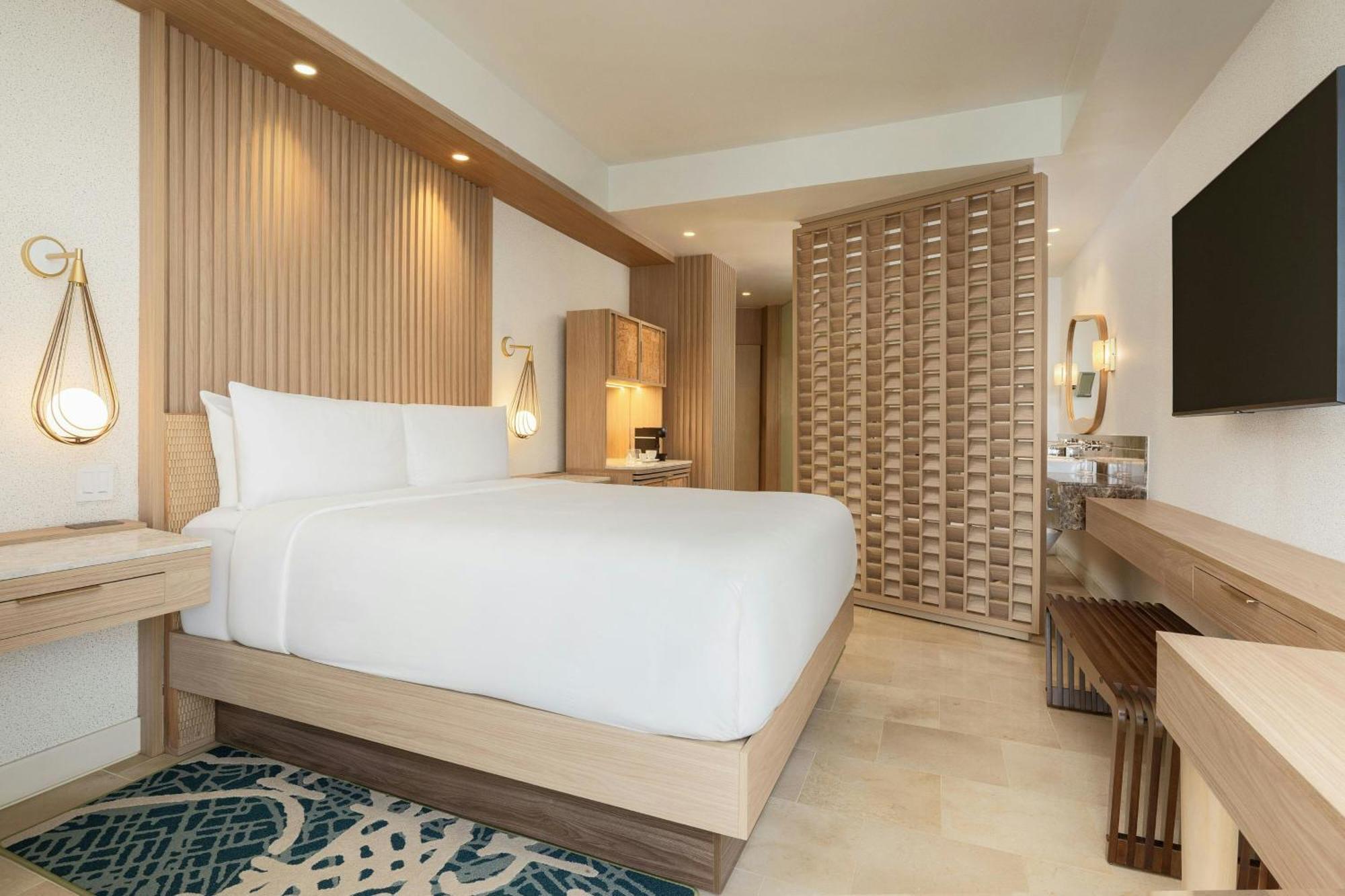 King Guest Room Balcony Partial Ocean View