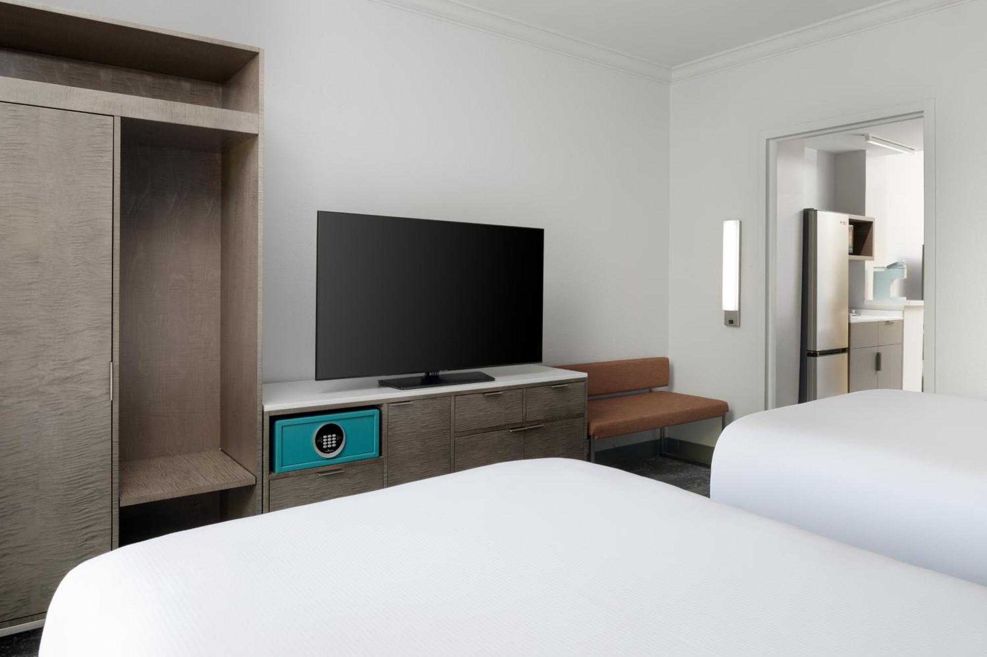 One-Bedroom Suite Two Double Beds Bath Tub Sofa Bed
