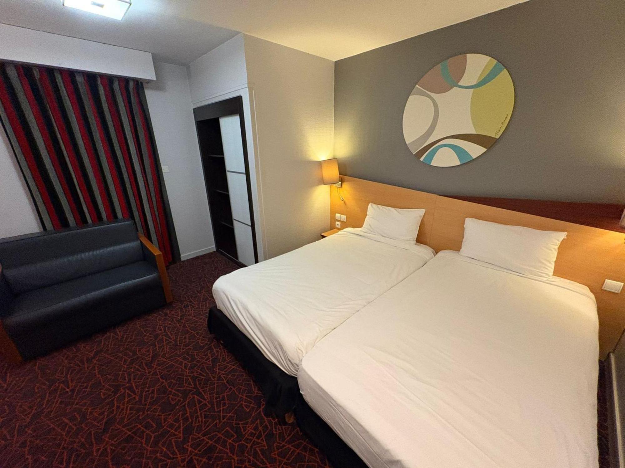 Standard Room 2 Single Beds 1 Sofa Bed