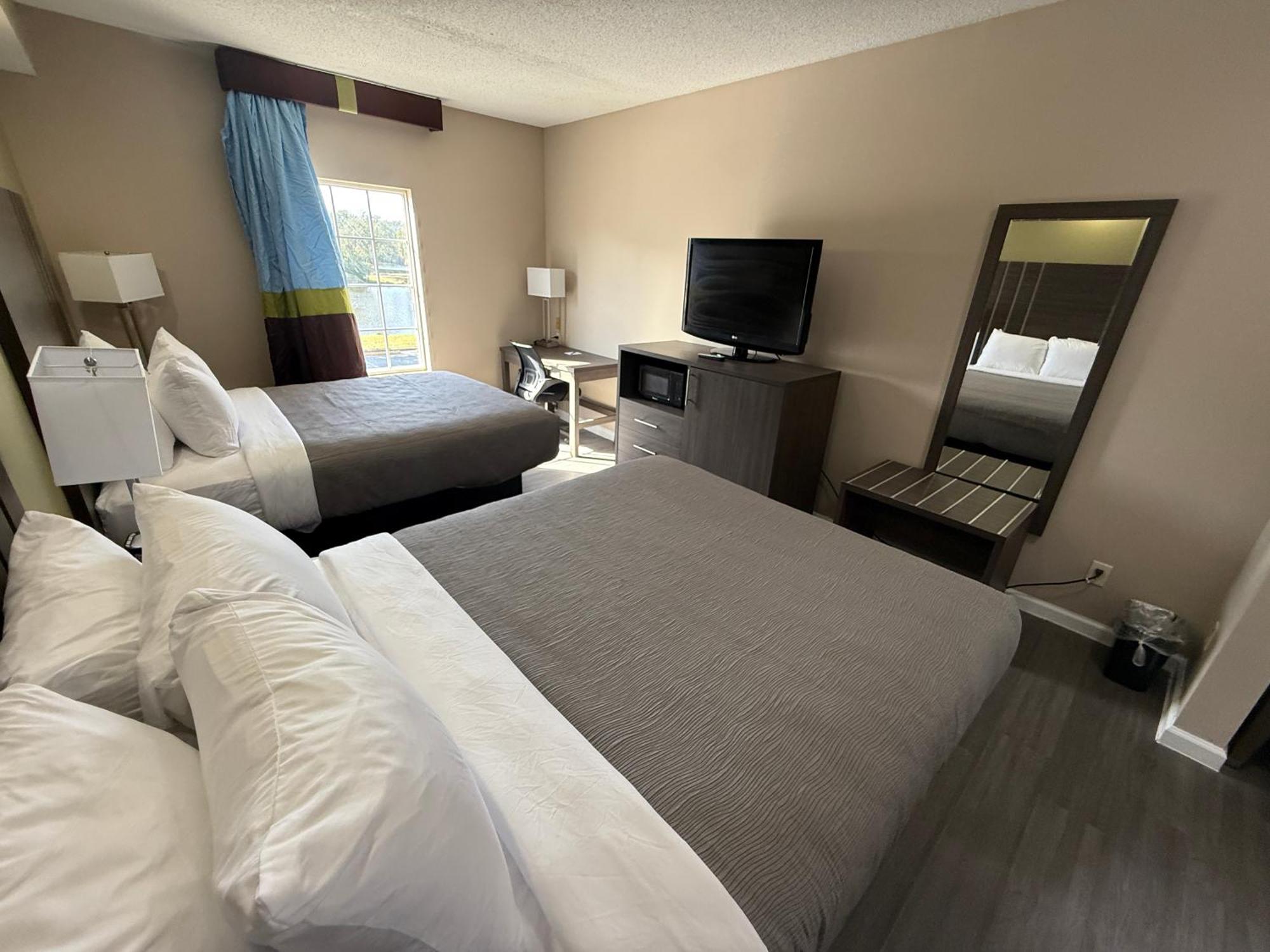 Quadruple Room Two Queen Beds Disability Access or Non Smoking,1742836919:JPEG