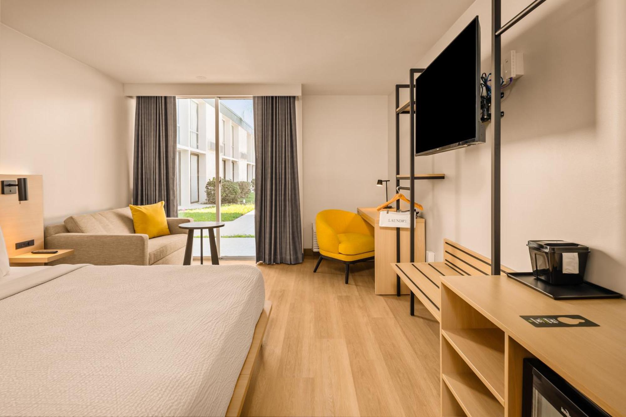 One King Bed Mobility or Hearing Handicap Room Roll Shower Non Smoking