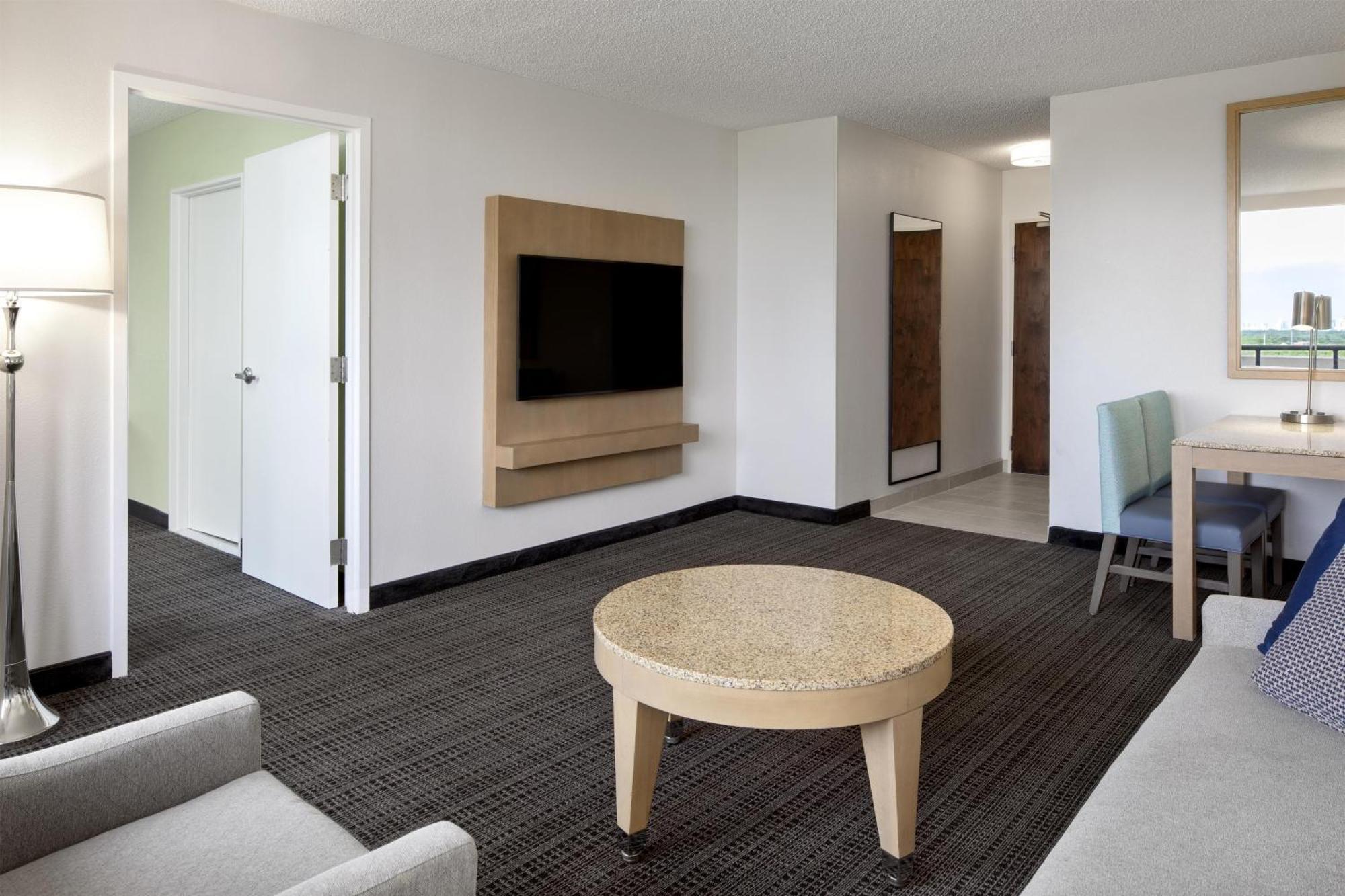 Two Queen Suite or Mobility Access Bath Tub