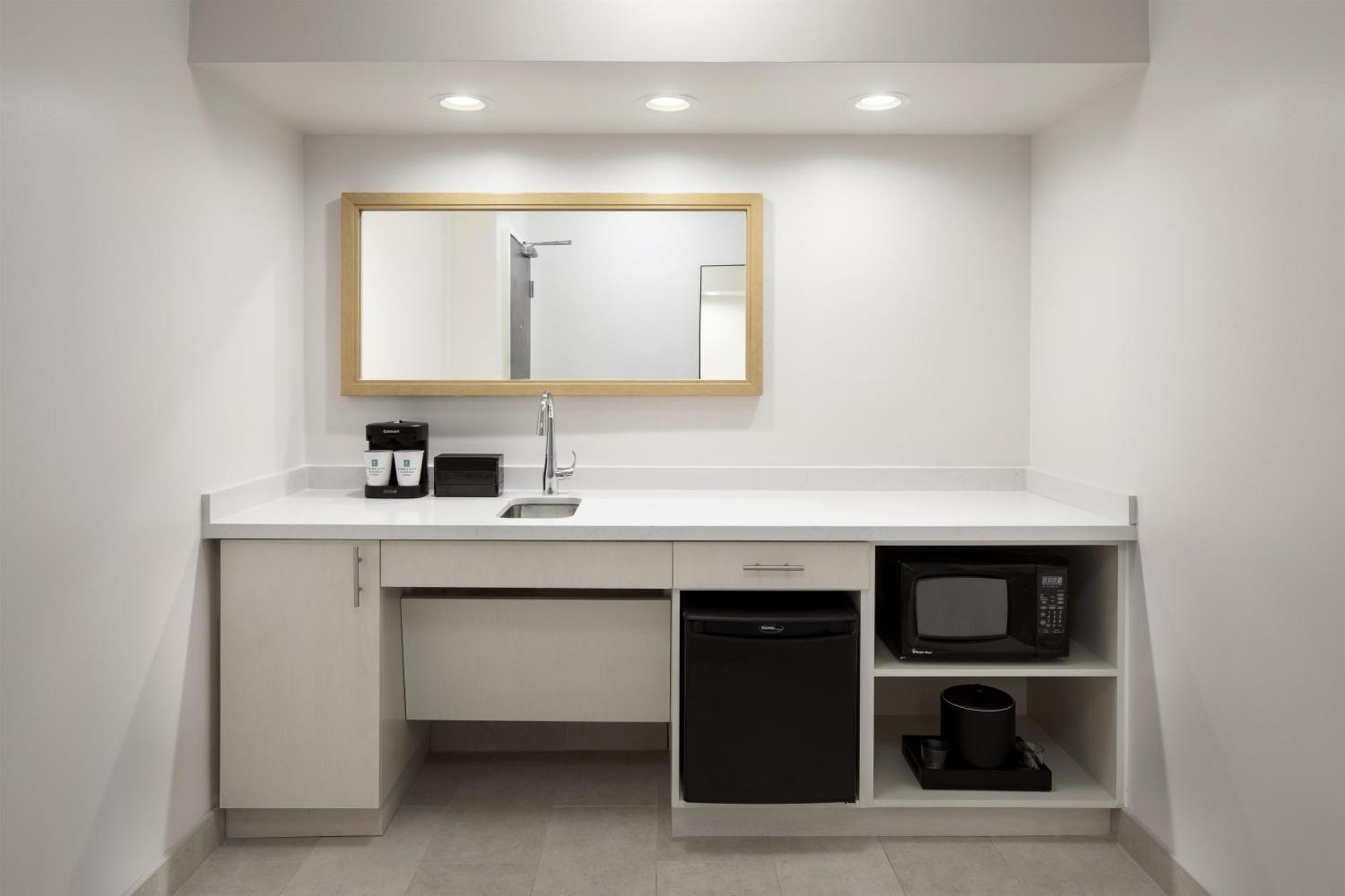 Two Queen Suite or Mobility Access Bath Tub