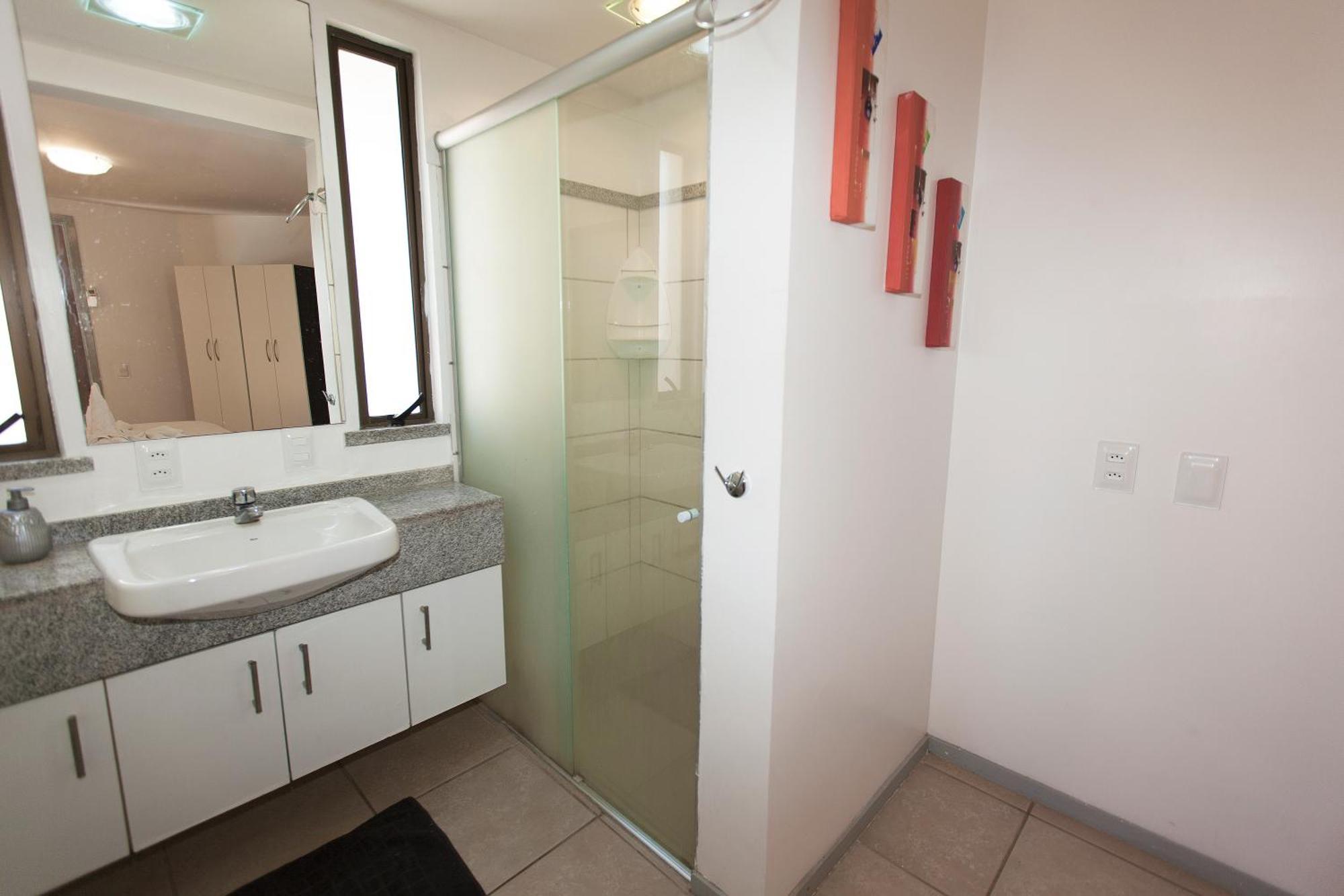 Two-Bedroom Apartment One Queen Bed Two single Beds