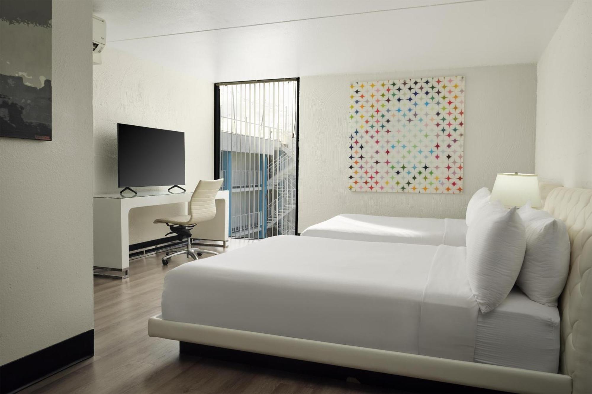 Deluxe Queen Room Two Queen Beds Pool View or Non-Smoking