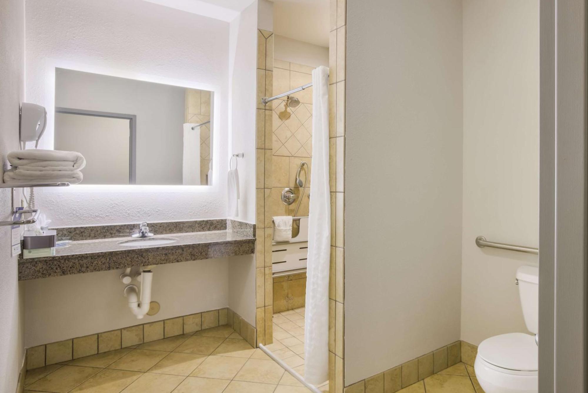 King Room Roll Shower Jetted Tub Mobility Accessible or Non-Smoking