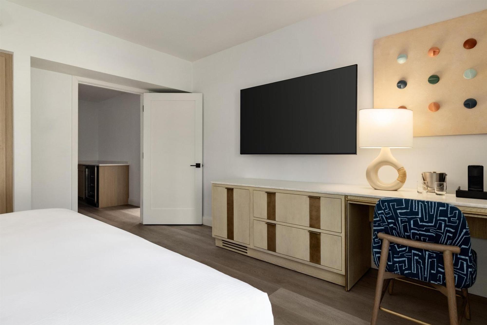 Room with Two Queen Beds and Pool with Patio