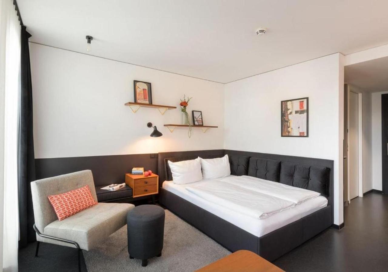 Apartment M mit Kingsize-Bett und Terrasse
