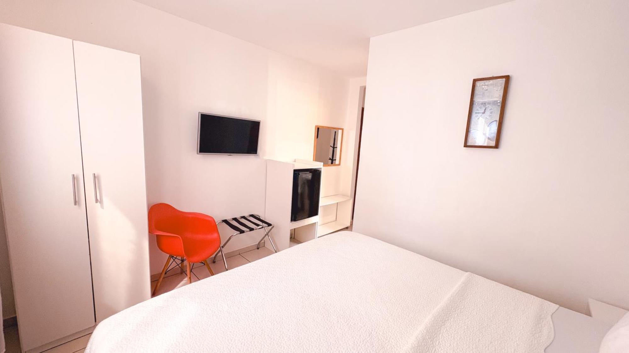 Quarto Standard com Cama de Casal ou 2 de Solteiro e Vista do Jardim