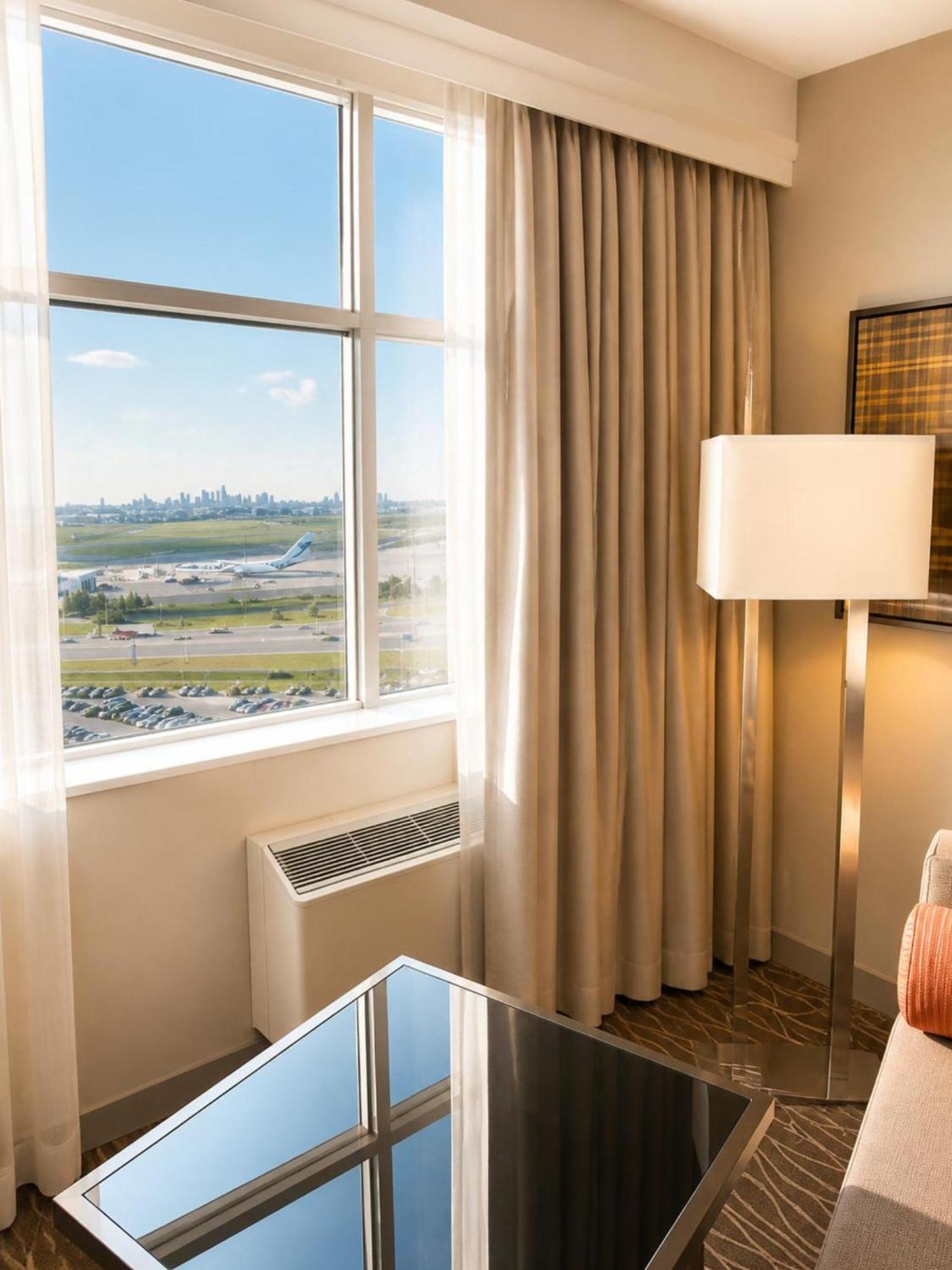 Queen Room Two Queen Beds Airport View