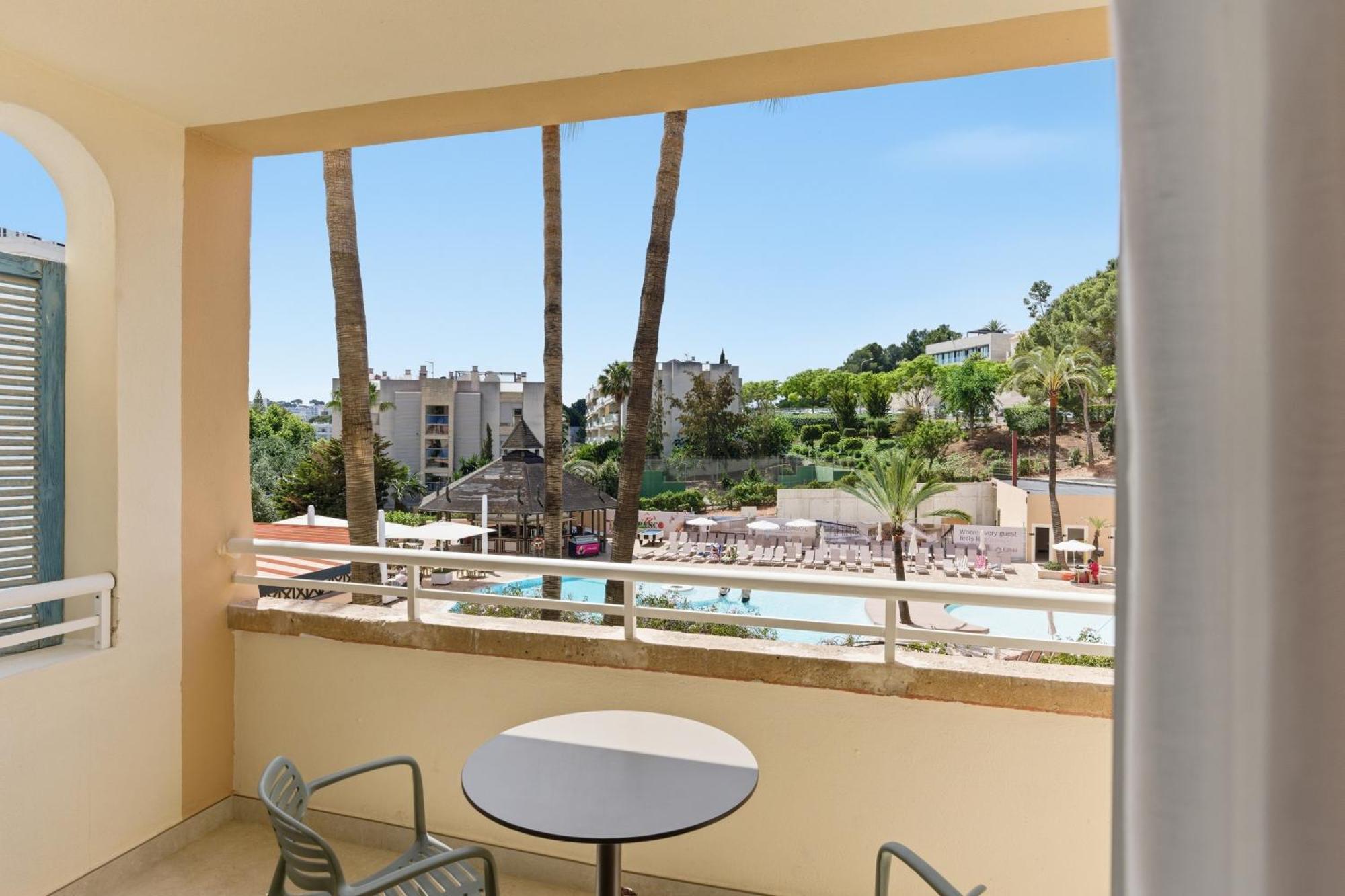 One-Bedroom Apartment Pool View,1772905802:JPEG