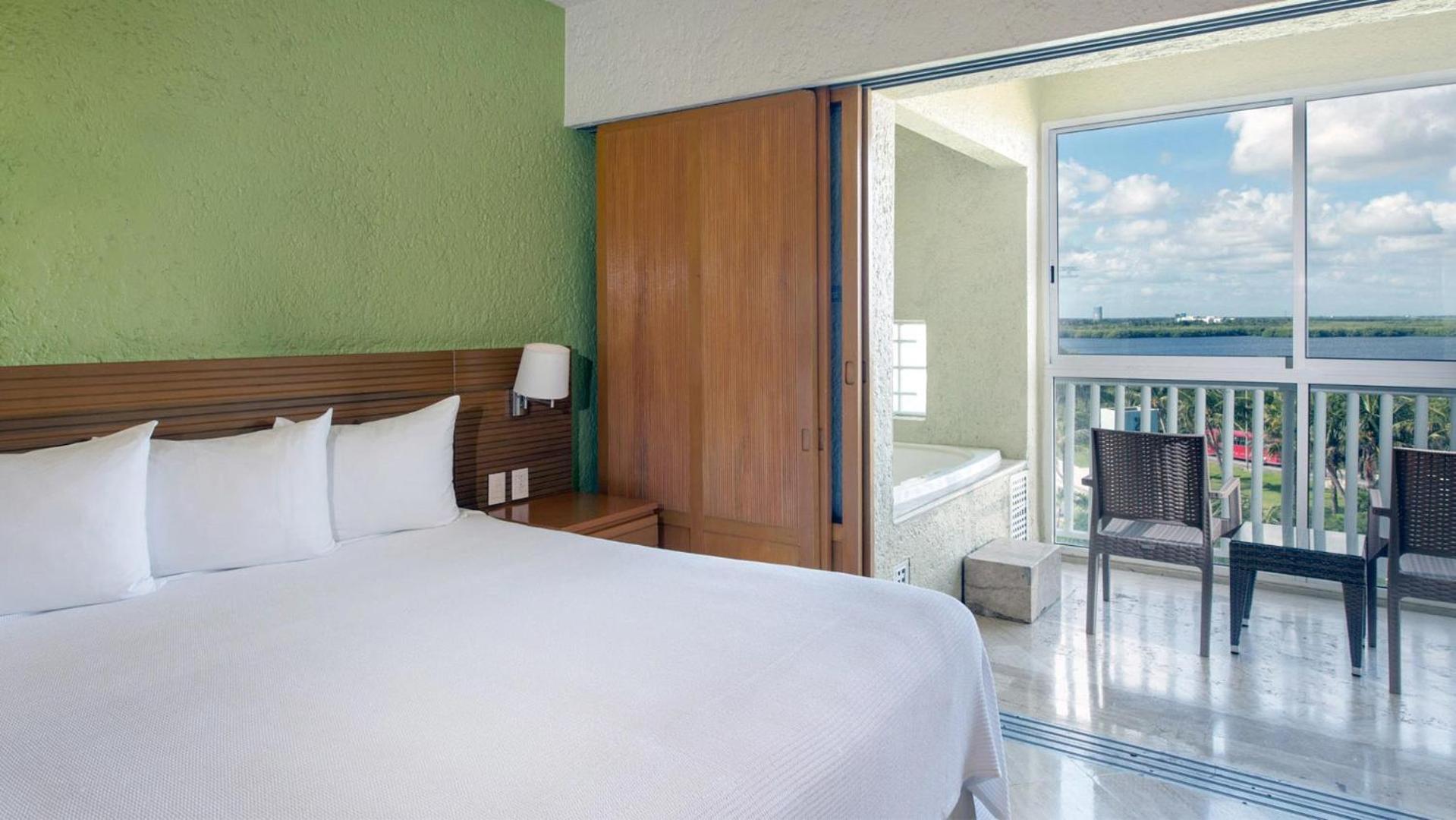 One-Bedroom King Suite Jacuzzi Balcony Lagoon View