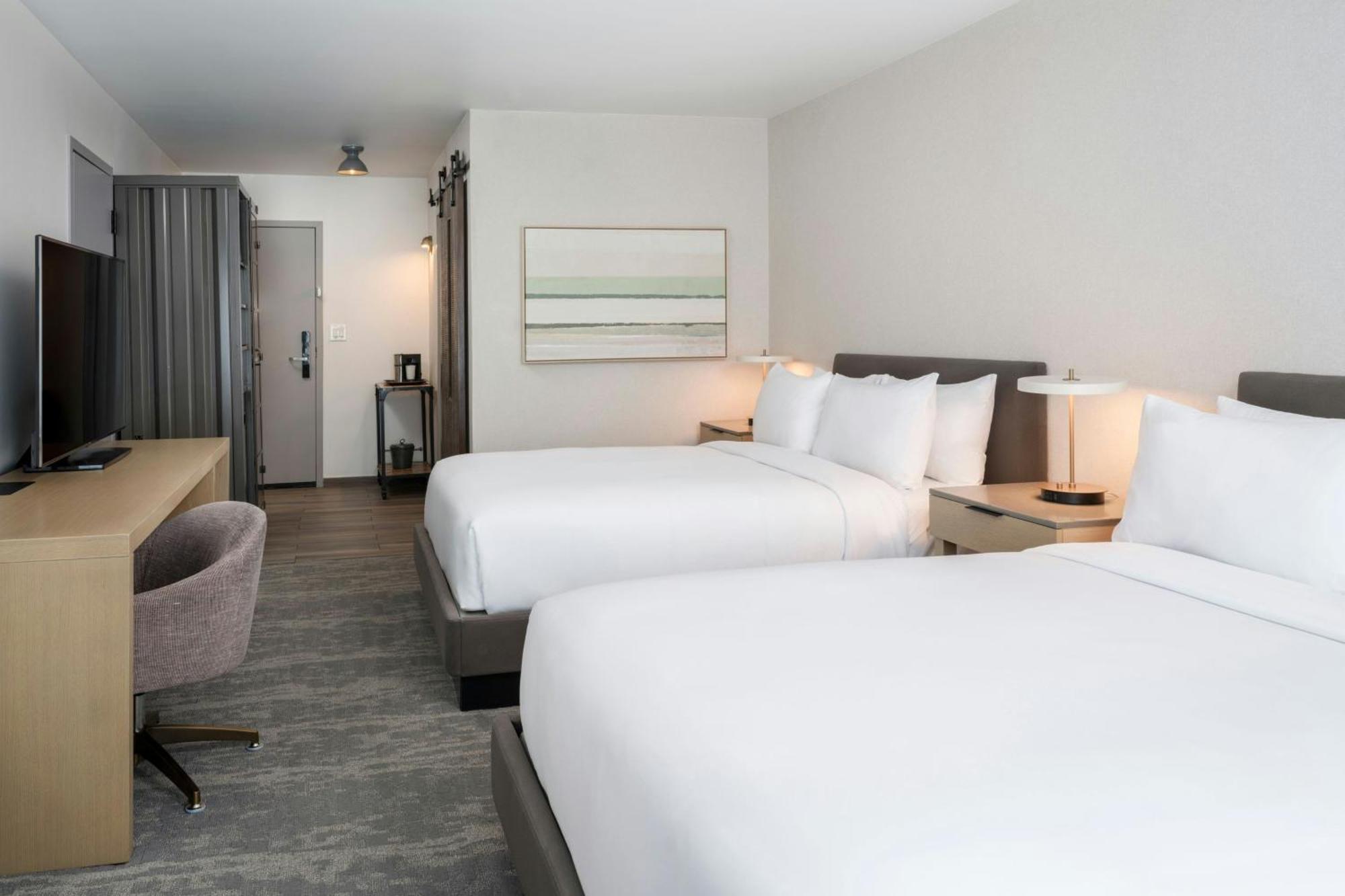 Queen Room with Two Queen Beds, Courtyard View and Roll-in Shower - Mobility and Hearing Accessible