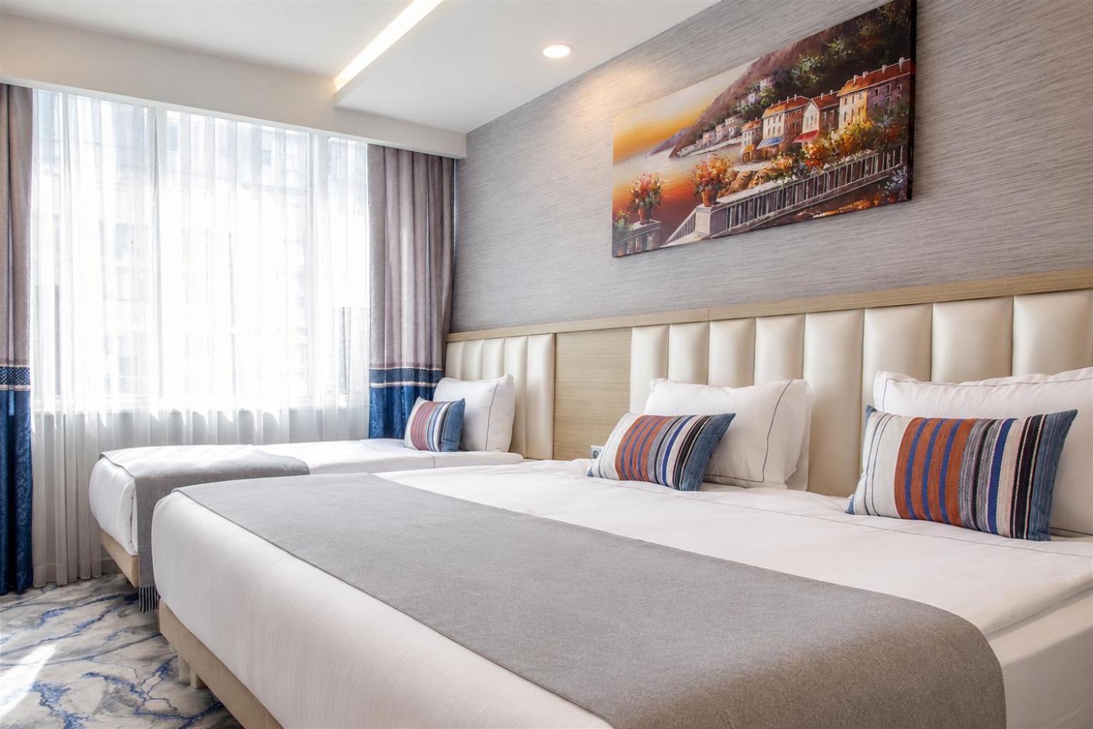Deluxe Triple Room