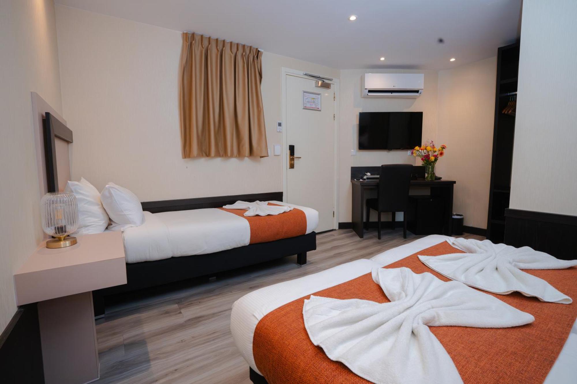 Deluxe Triple Room
