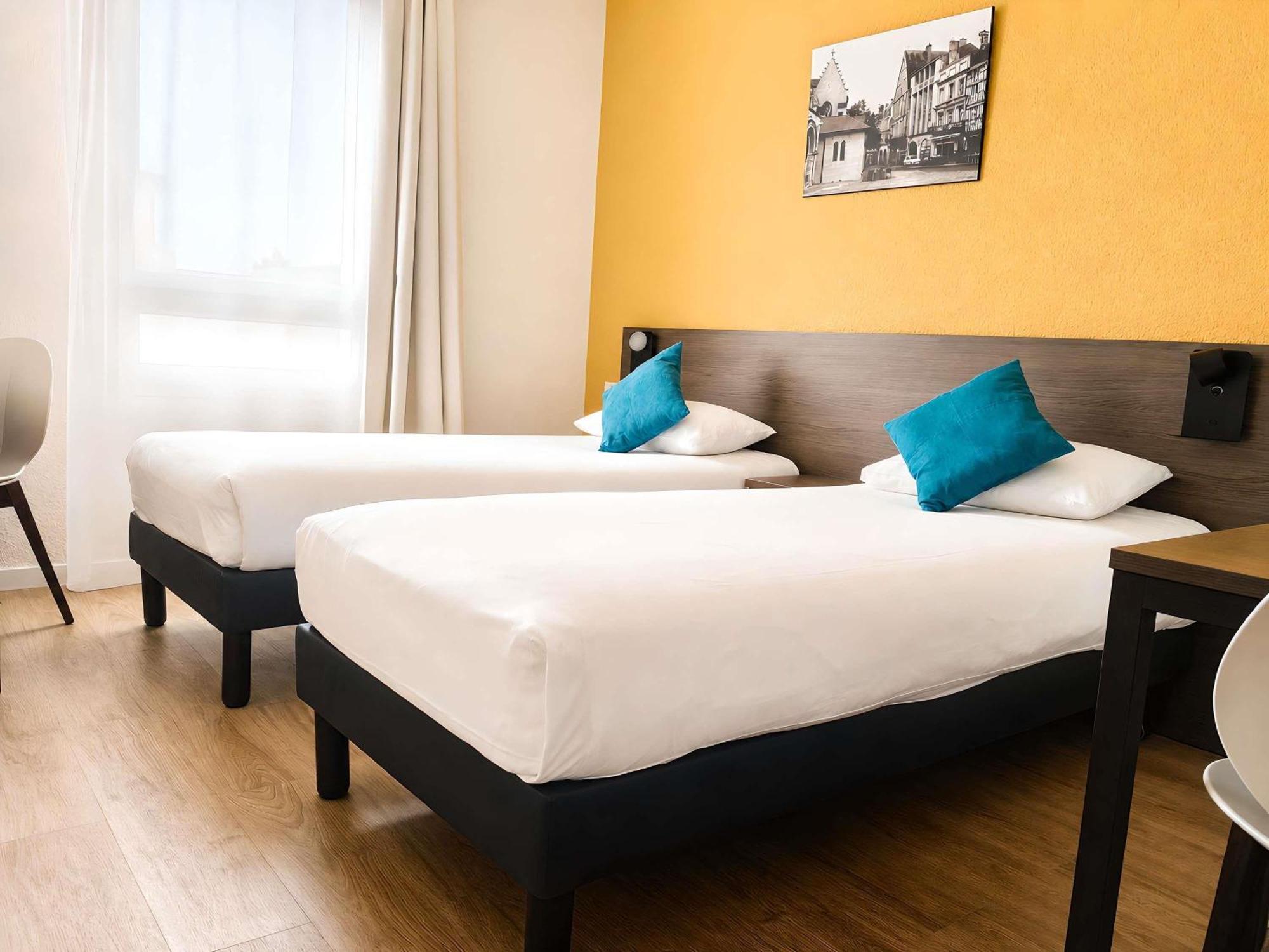 Studio Twin Beds