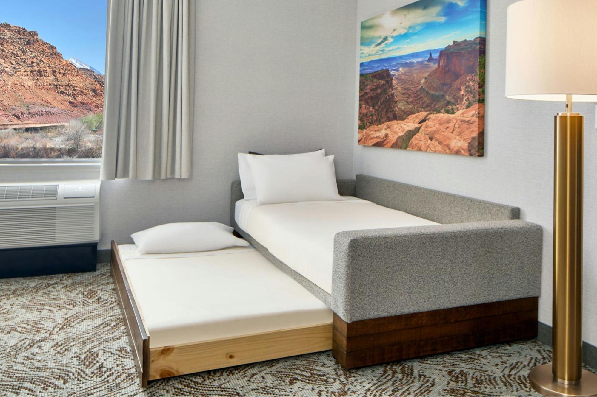 Queen Suite Two Queen Beds Trundle Sofa