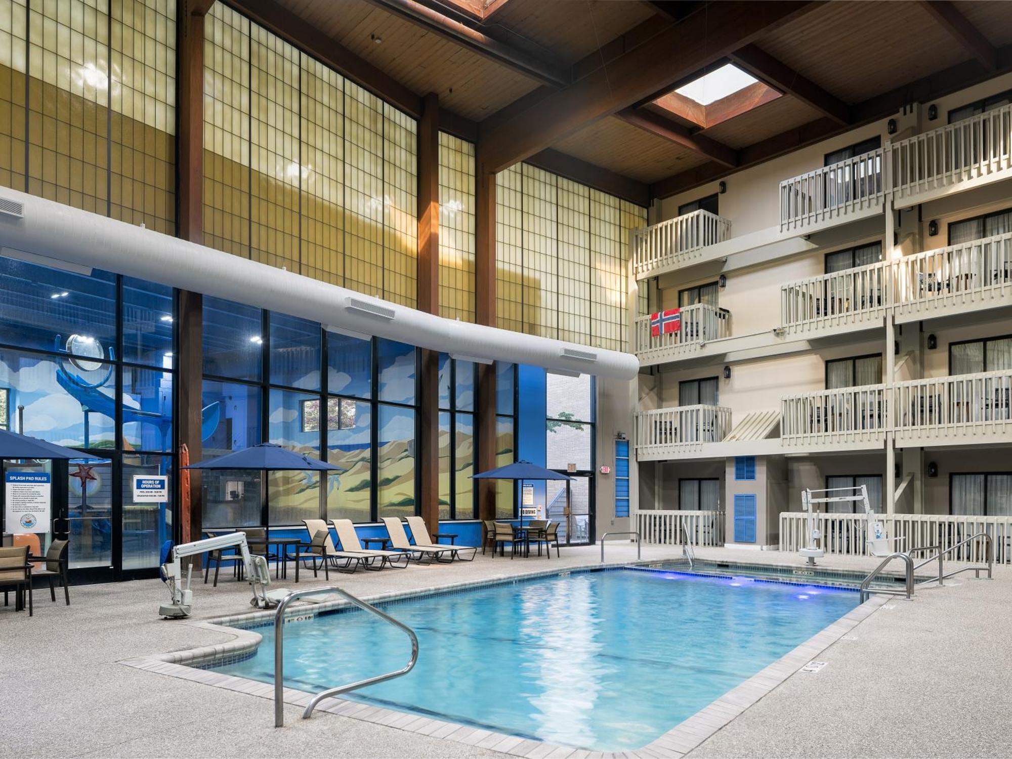 Two Queen Beds Indoor Balcony Poolview