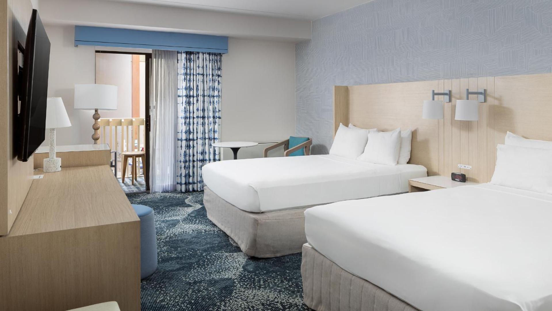Two Queen Beds Indoor Balcony Poolview