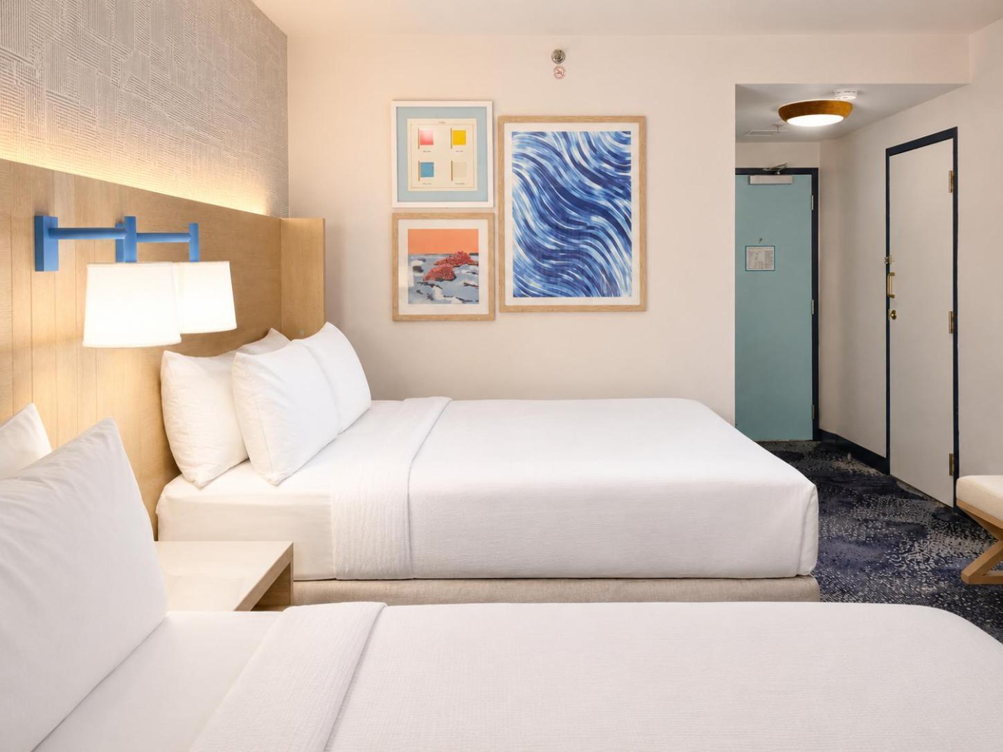 Two Queen Beds Indoor Balcony Poolview