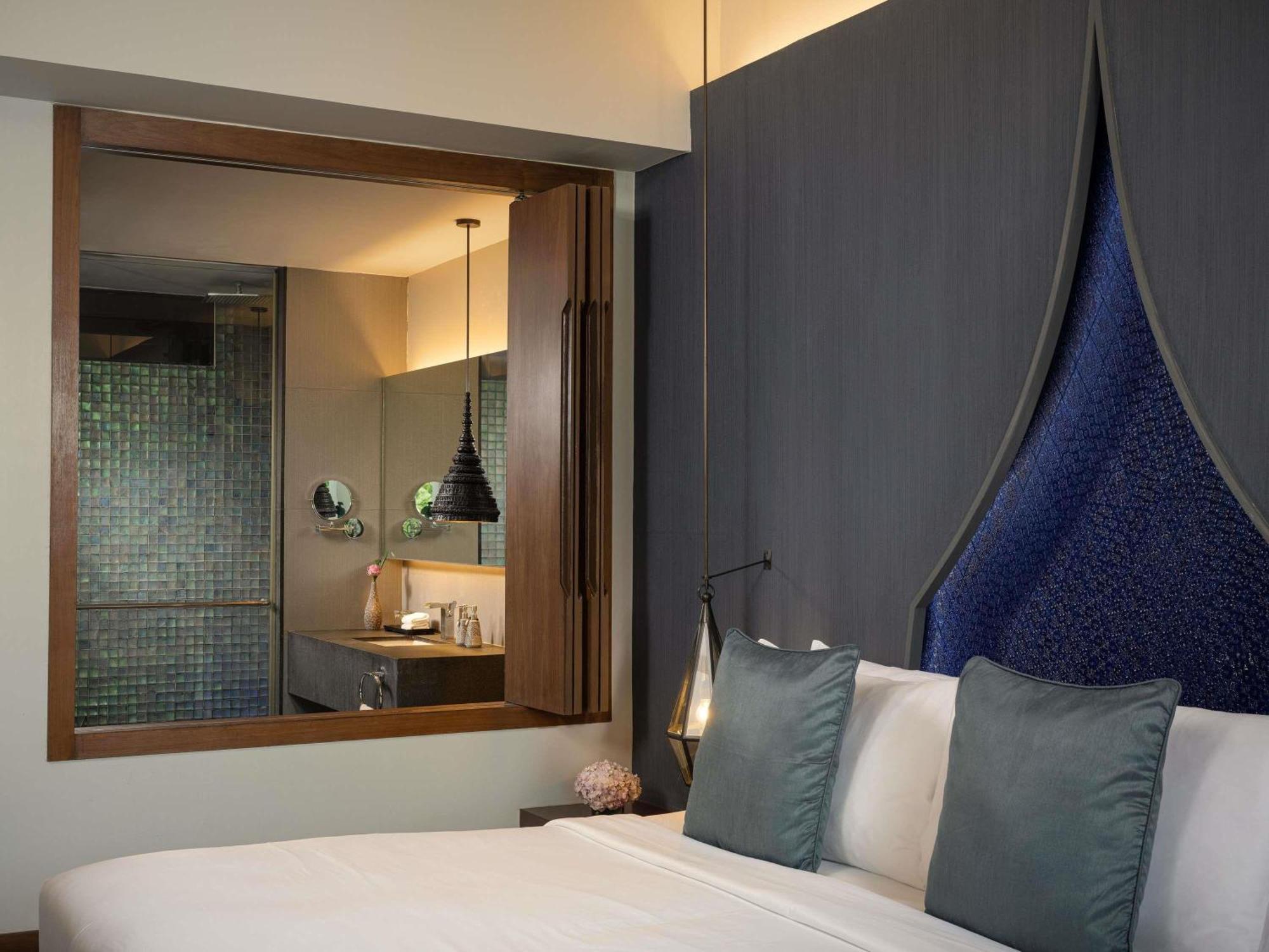 Deluxe King Room Sofa Bed Pool View