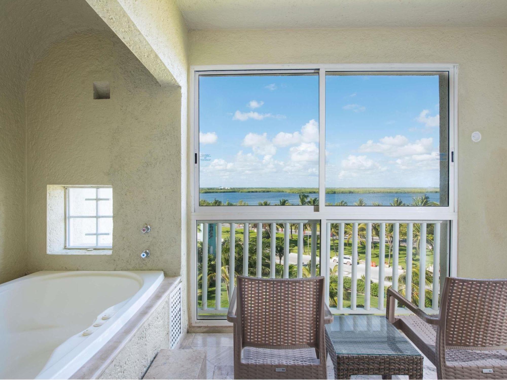 One-Bedroom King Suite Jacuzzi Balcony Lagoon View