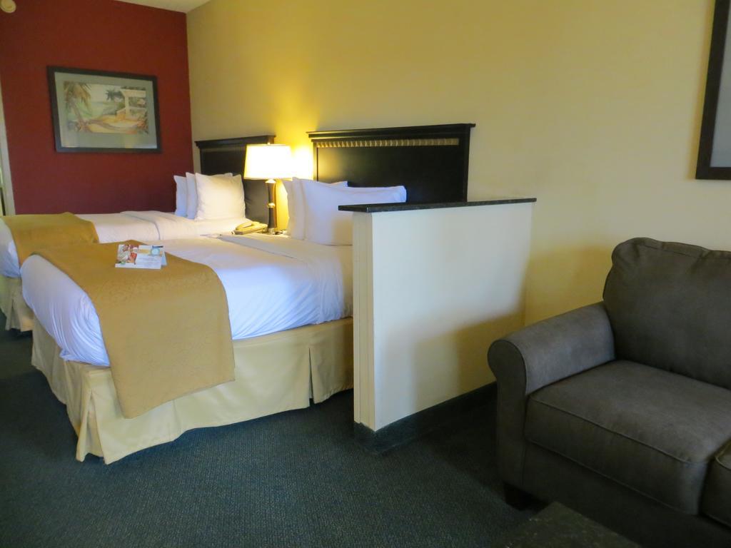 Suite with Two Double Beds with Sofa Bed - Pool View
