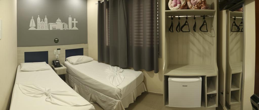 Quarto Executivo com 2 Camas de Solteiro