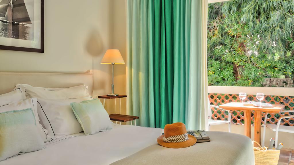 Triple room a west-facing garden view a balcony access to the spa private beach,1772087115:JPEG