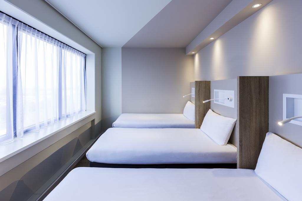 Room Three Single Beds
