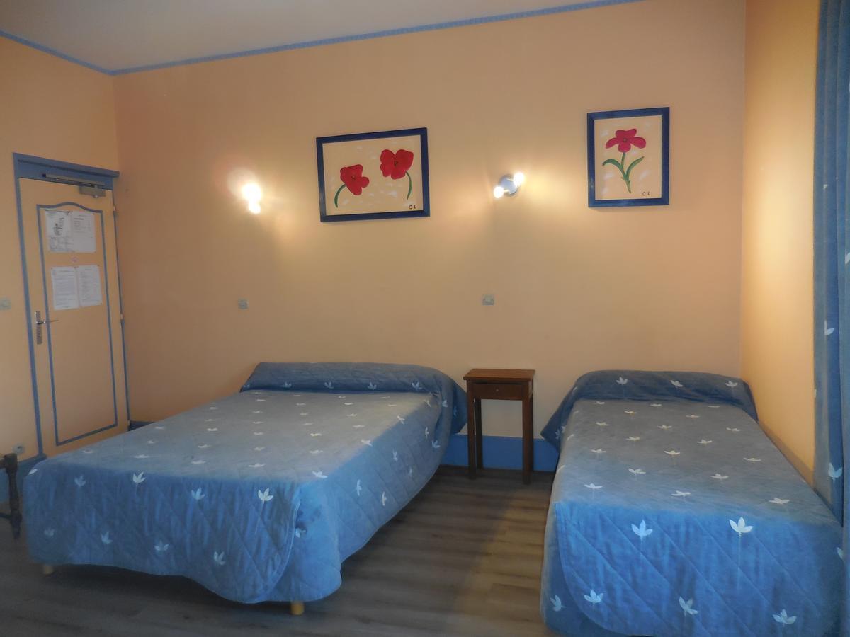 Chambre Triple - Vue sur Ville