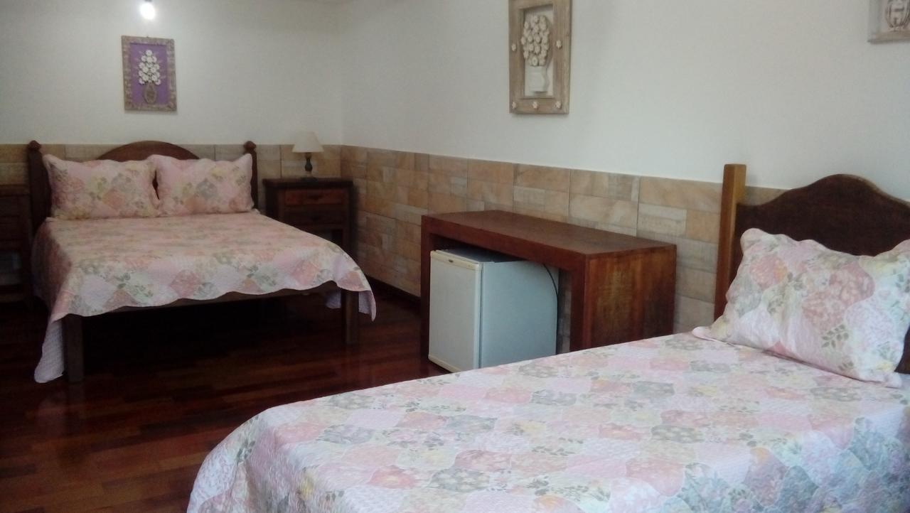 Quarto Triplo com Ar Condicionado