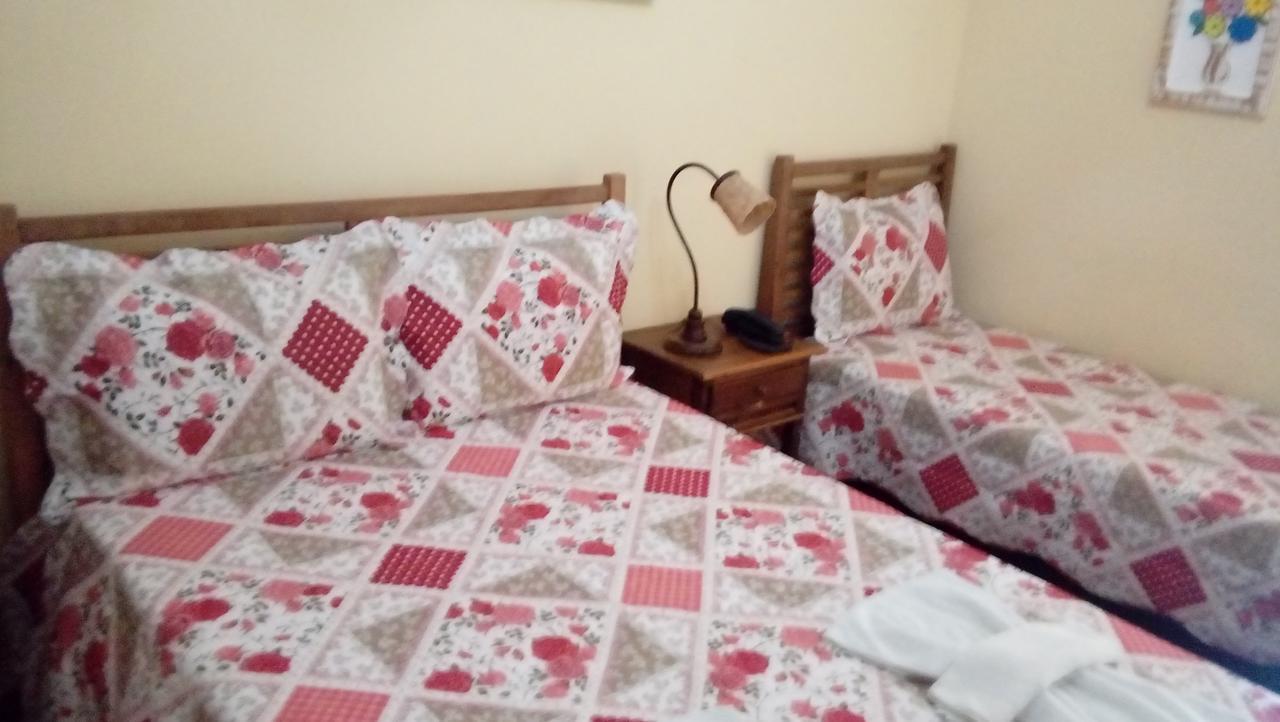 Quarto Triplo com Ar Condicionado