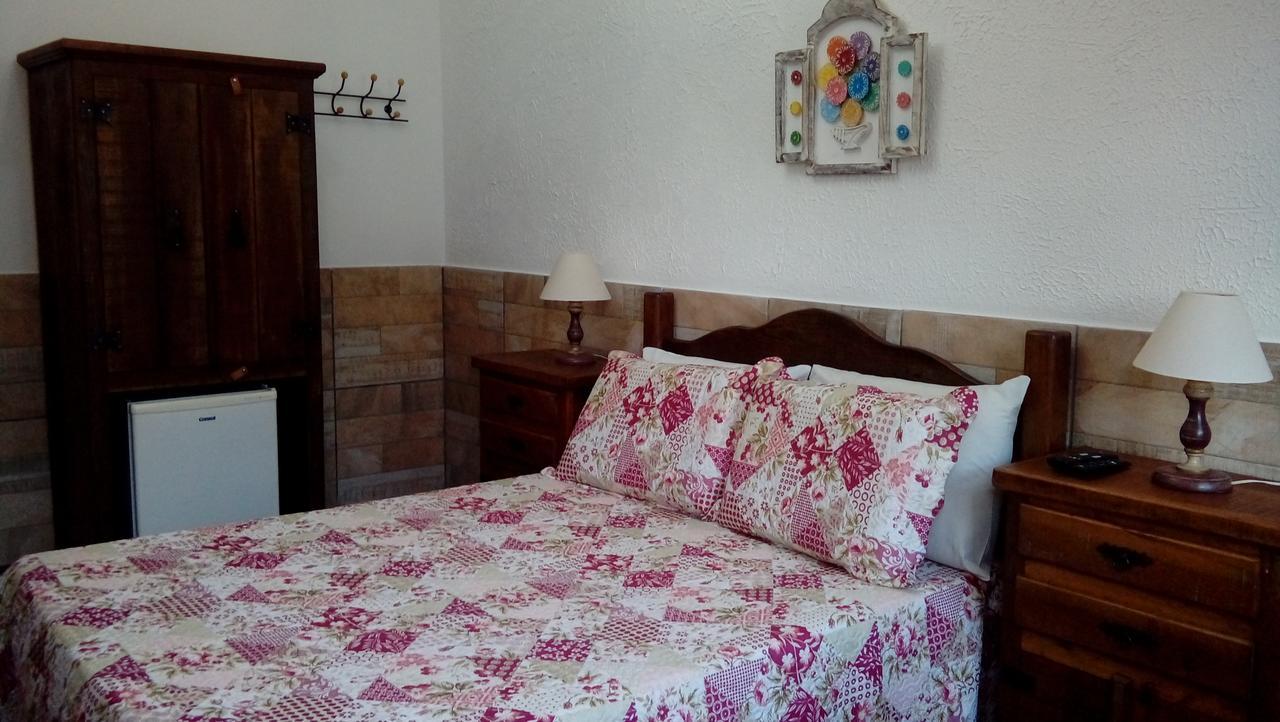 Quarto Triplo com Ar Condicionado