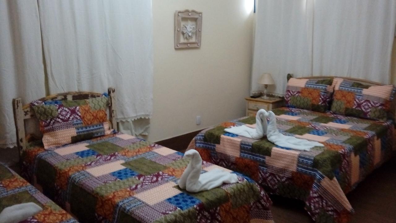 Quarto Triplo com Ar Condicionado