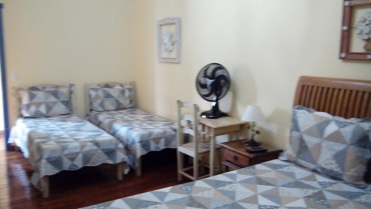 Quarto Triplo com Ar Condicionado