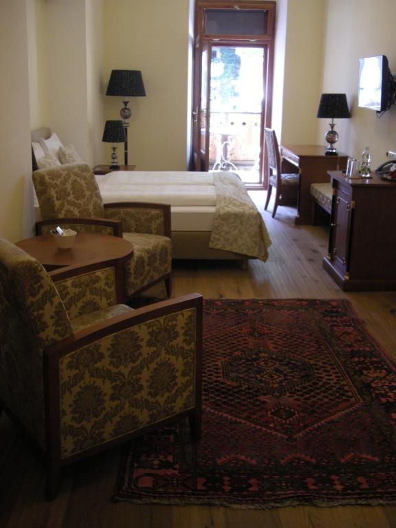 Double Room Balcony Facing the Market Square,65743747:JPEG